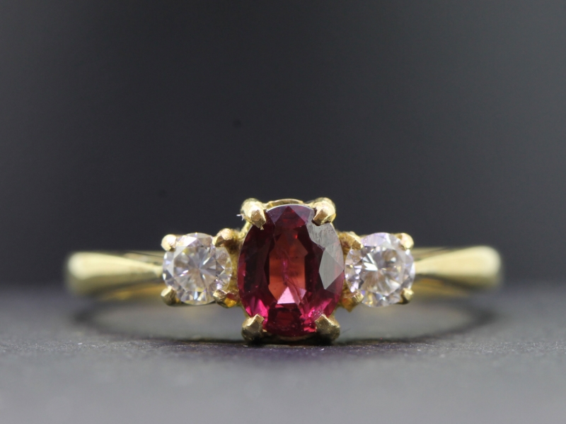 Lovely ruby and diamond 18 carat gold trilogy ring