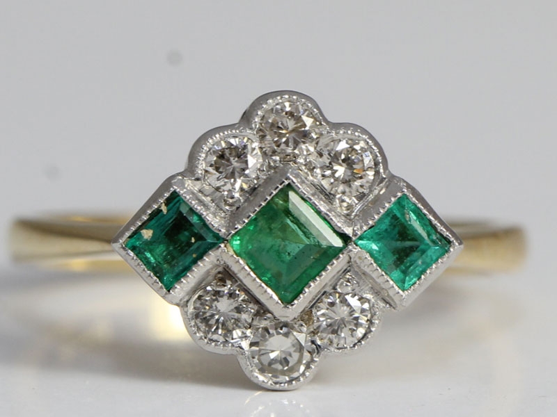  fabulous unique emerald and diamond 18 carat gold art deco inspired ring