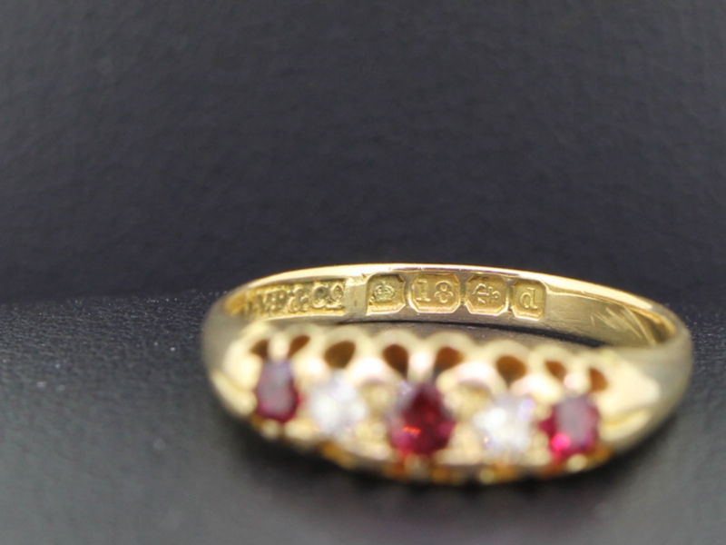 Gorgeous ruby and diamond 18 carat gold gypsy ring
