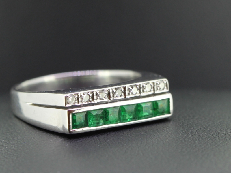 Contemporary emerald and diamond 18 carat gold ring