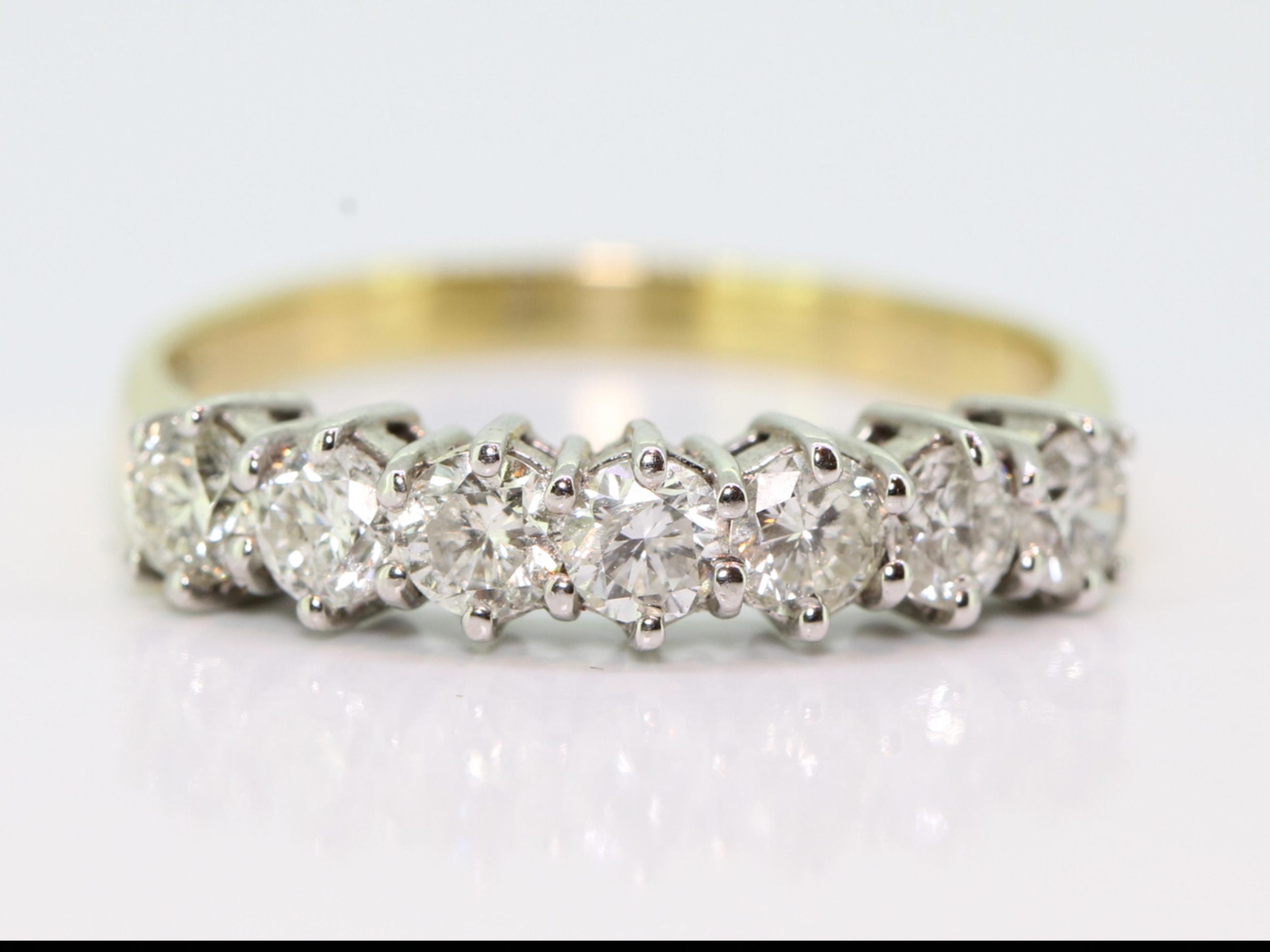 Stunning seven stone diamond 18 carat gold eternity ring