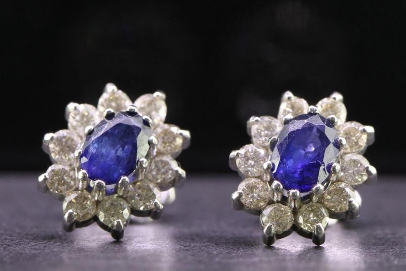 Striking pair of sapphire and diamond 18 carat gold stud earrings