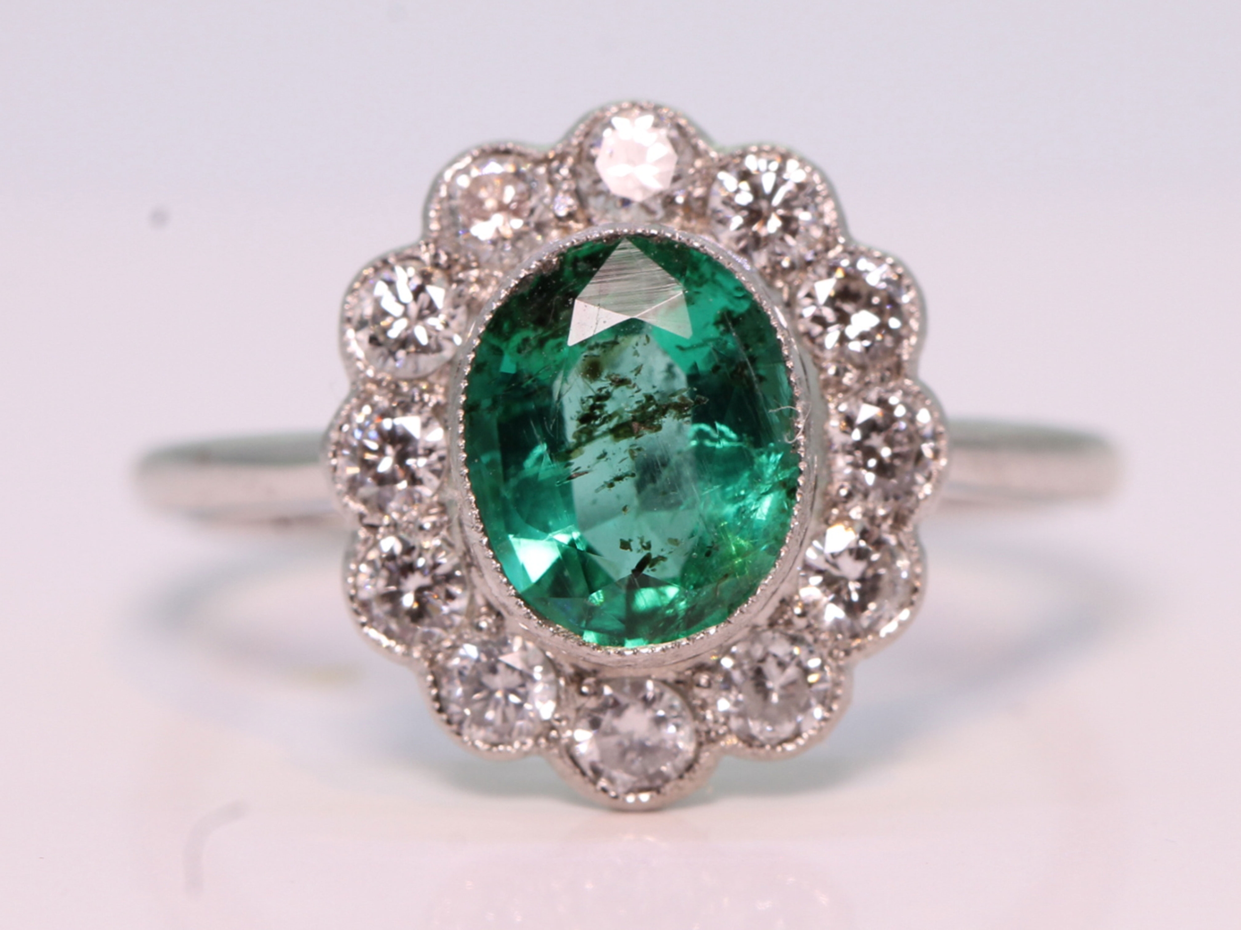  vintage colombian emerald and diamond platinum cluster ring 