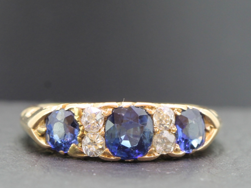 Stunning edwardian carved half hoop sapphire and diamond 18 carat gold ring