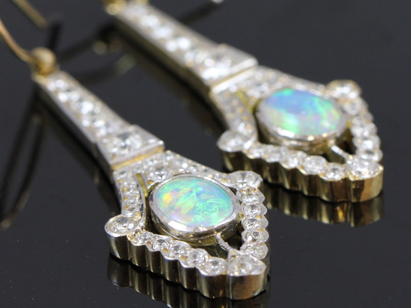 Exceptional art deco inspired opal and dimaond long drop 18 carat gold earrings