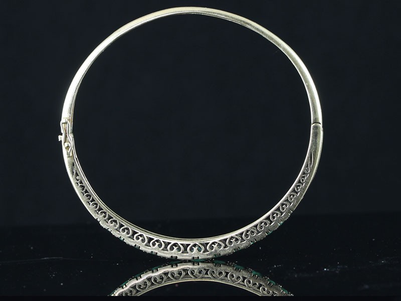 Wonderful emerald and diamond bangle handcrafted in 9 carat gold