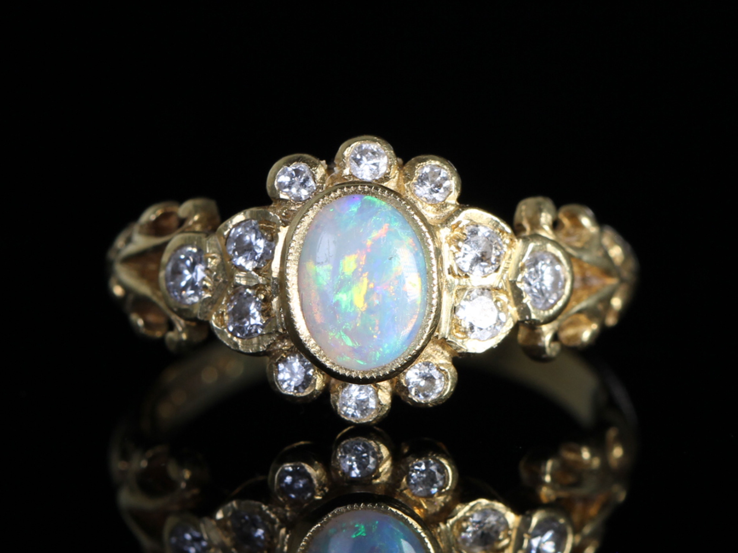 Vintage opal and diamond 18ct gold ring