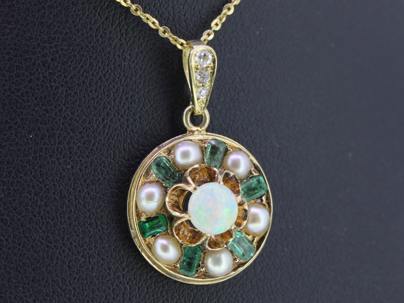 Lovely edwardian emerald pearl and opal 18 carat gold circular pendant