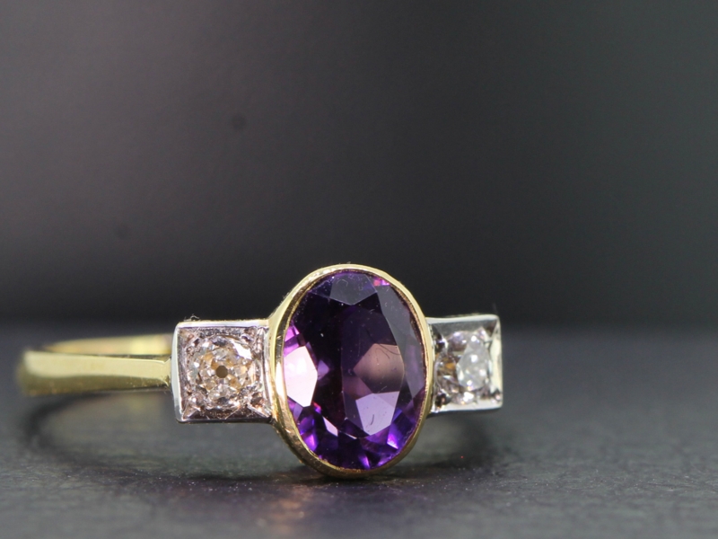 Elegant amethyst and diamond 18 carat gold trilogy ring 