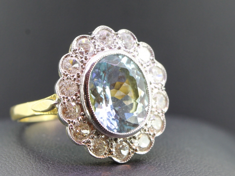 Impressive 4 carat aquamarine and diamond cluster 18 carat gold ring