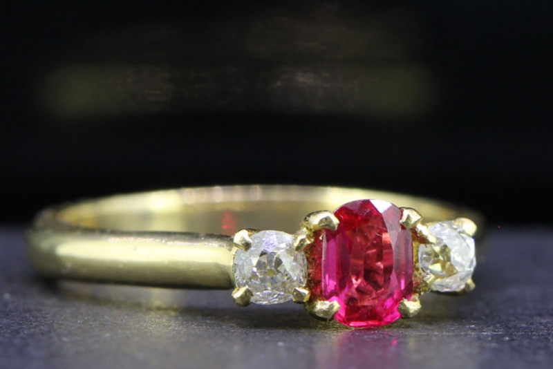Vibrant burmese ruby and diamond 18 carat gold trilogy ring