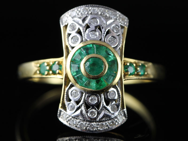  glamorous emerald and diamond cluster 18 carat gold ring