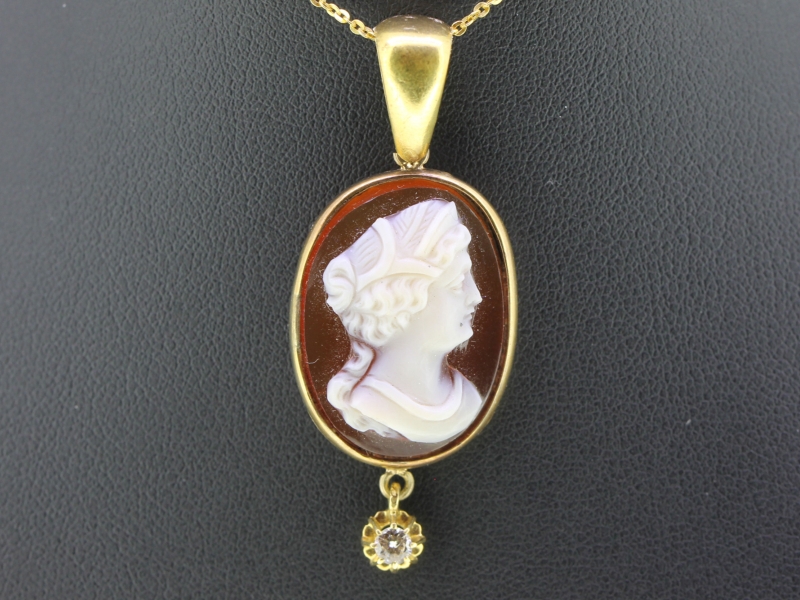 A fabulous antique edwardian cameo and diamond pendant