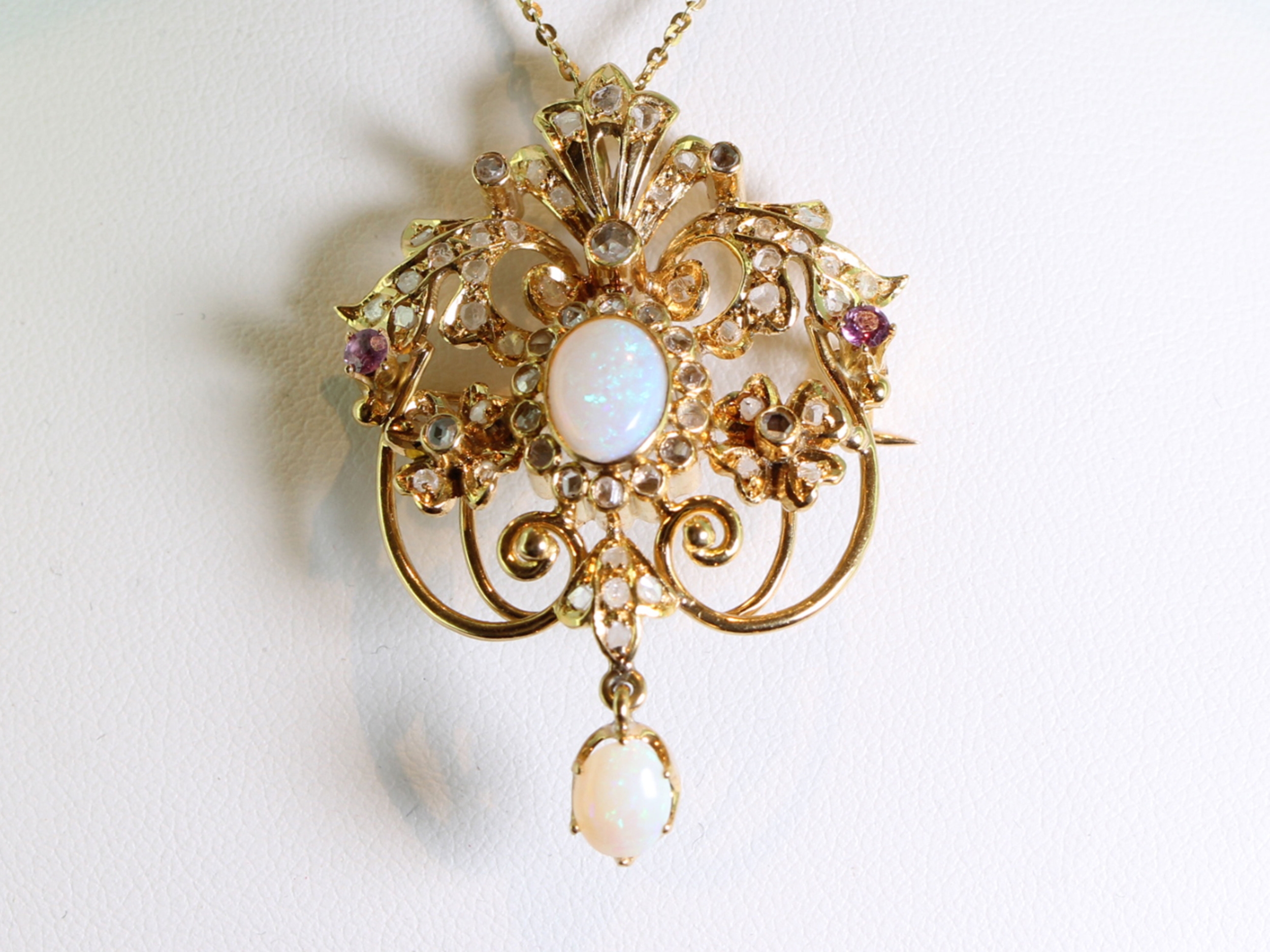  stunning opal, diamond and ruby 18 carat gold pendant/brooch