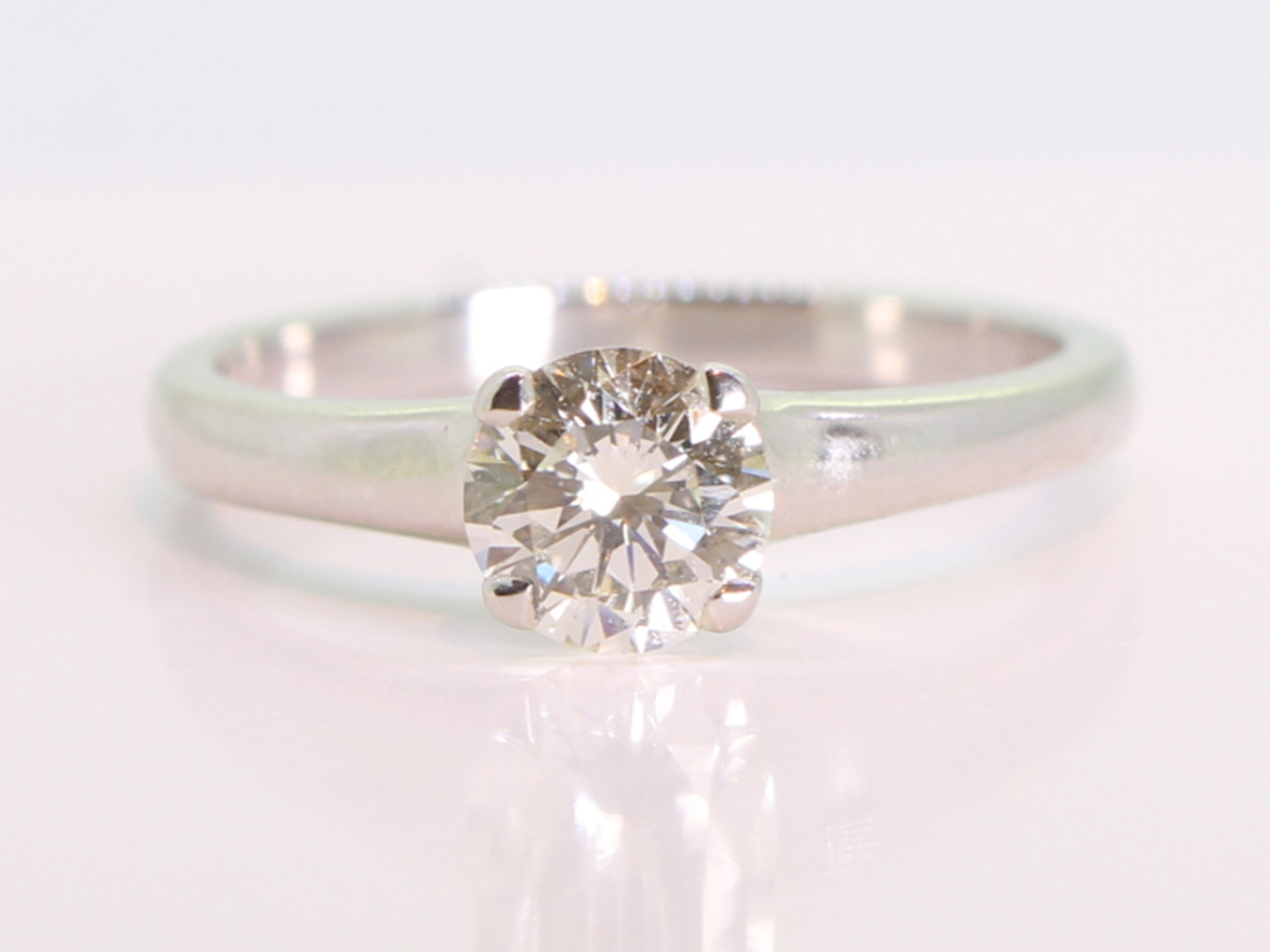 Brilliant cut 0.80ct diamond solitaire platinum ring 