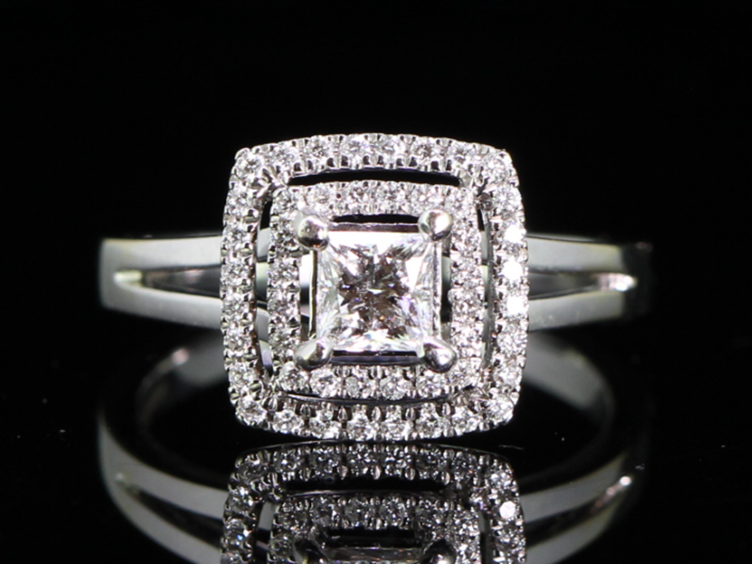 Stunning diamond double halo 18 carat gold ring 