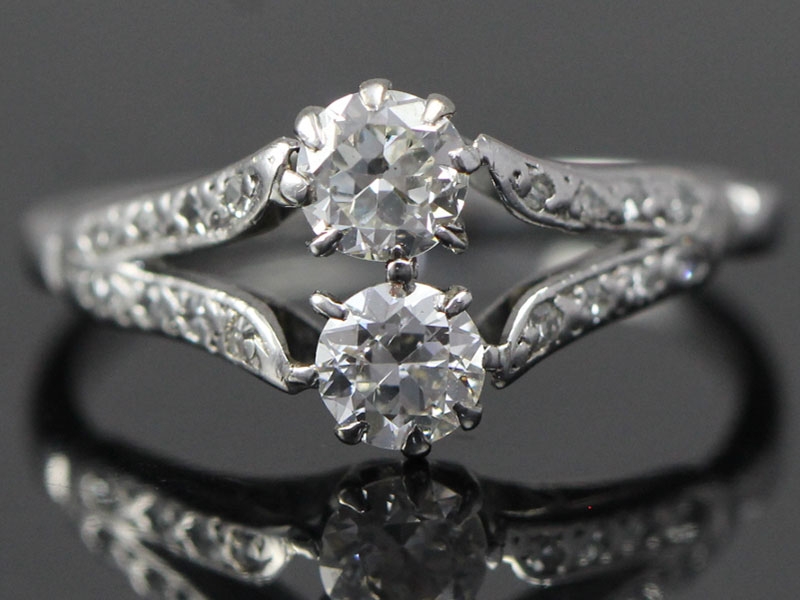 Unique art deco two stone diamond platinum ring