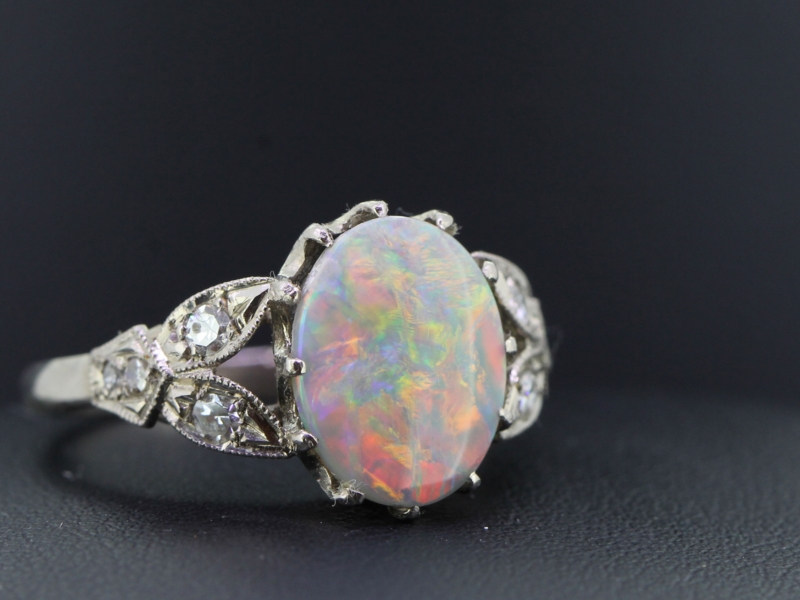 Stunning opal and diamond platinum ring