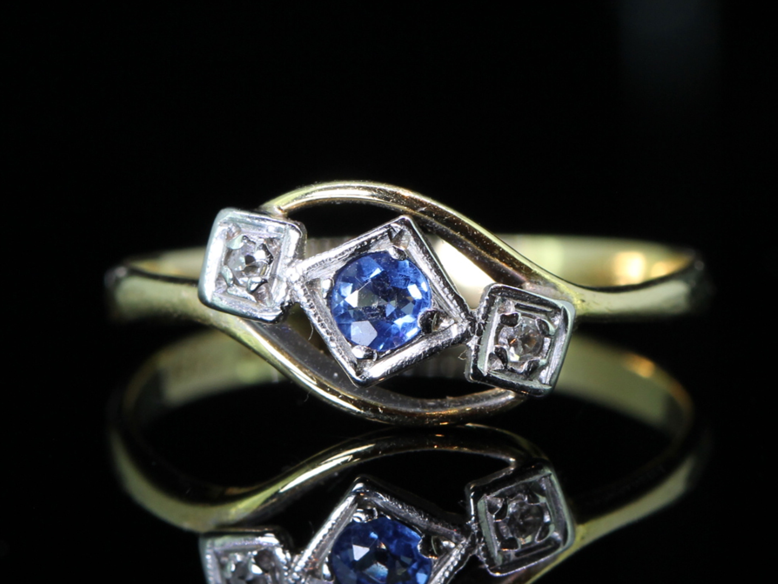 Elegant sapphire and diamond 18 carat gold and platinum trilogy ring