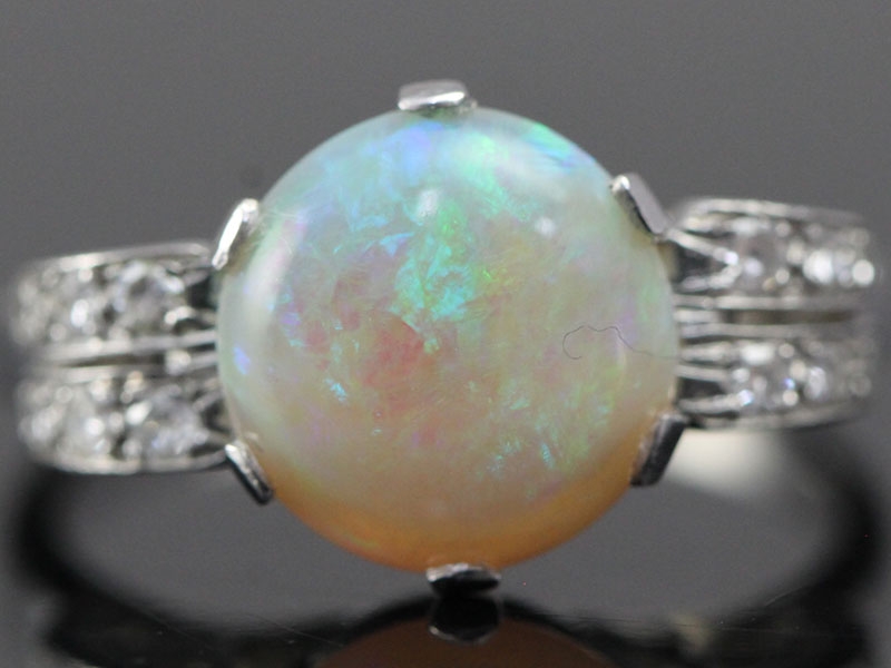Stunning art deco opal and diamond pltinum ring