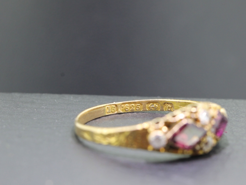 An edwardian almandine garnet and diamond 15 carat gold ring