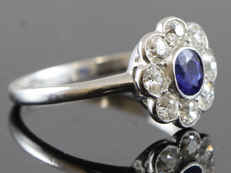 Beautiful edwardian sapphire and diamond daisy platinum ring
