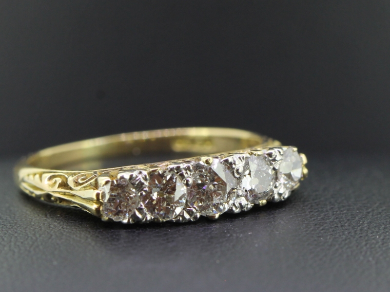 Pretty edwardian five stone diamond 18 carat gold ring