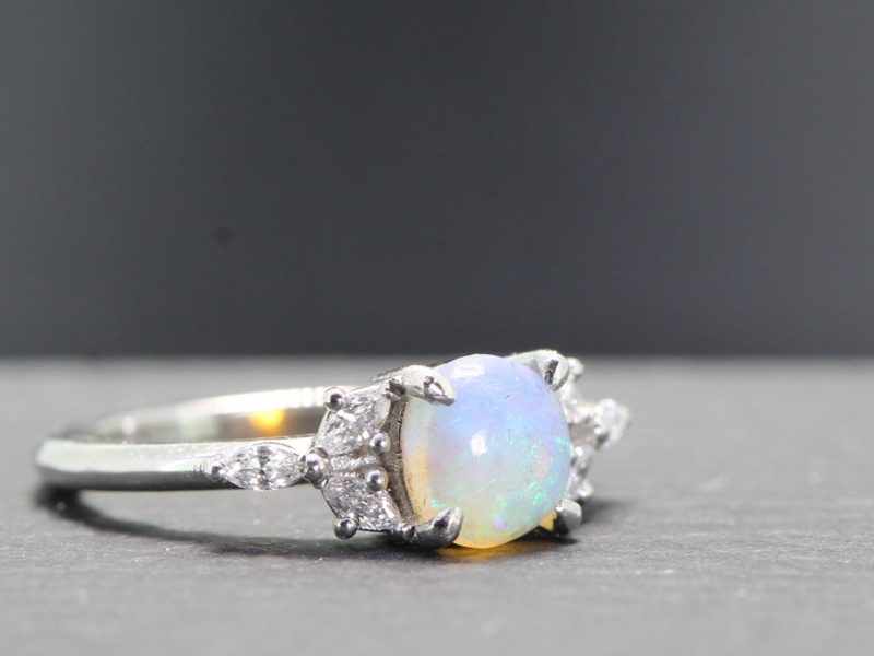 Beautiful opal and diamond platinum ring