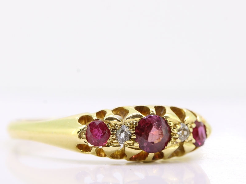 Lovely ruby and diamond 18 carat gold five stone ring