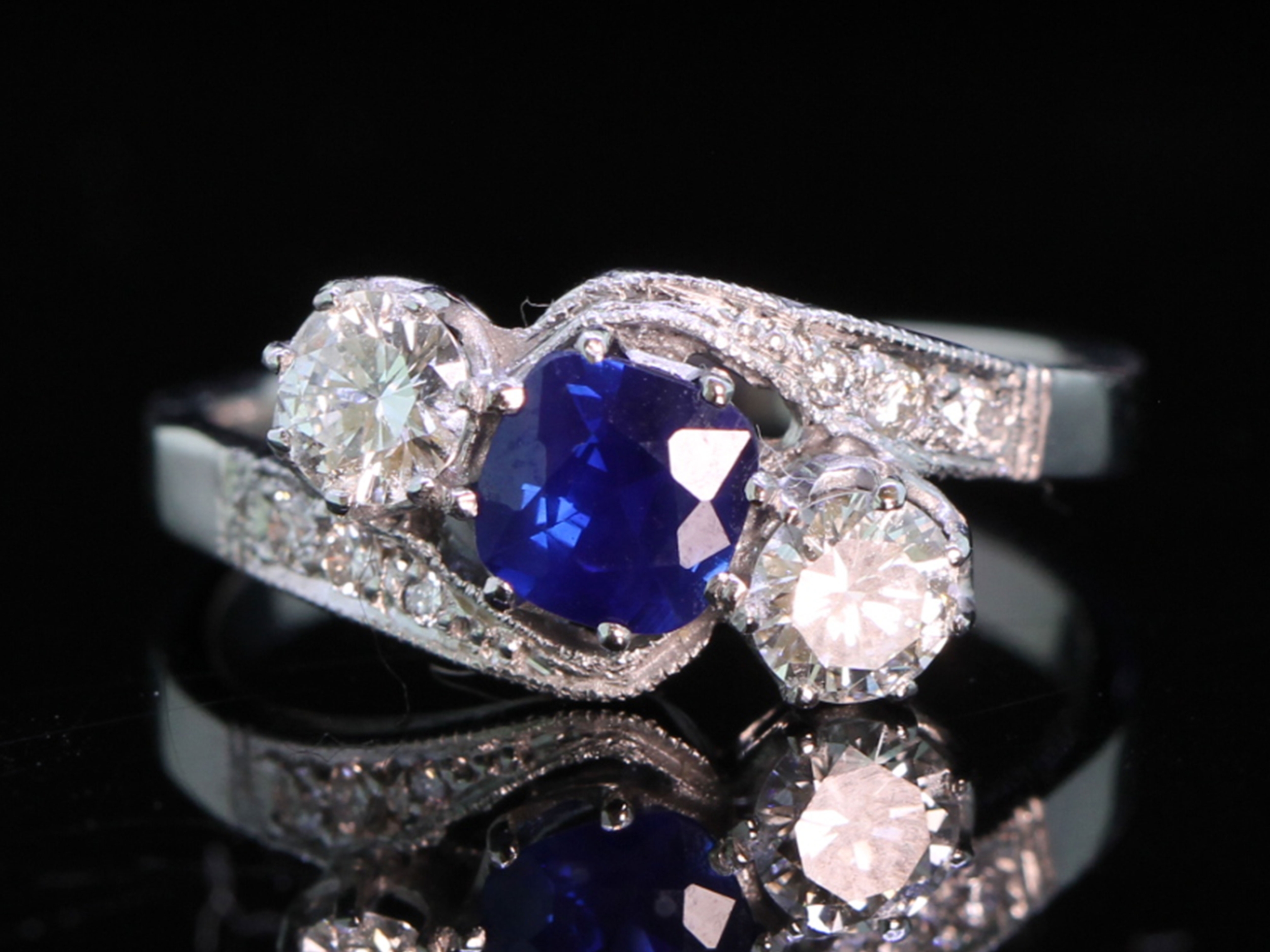 Stunning sapphire and diamond trilogy platinum edwardian  ring