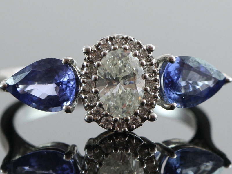  unique diamond and sapphire 18 carat gold  trilogy  ring