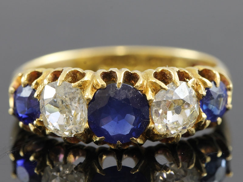Fabulous sapphire and diamond 18 carat gold gypsy ring