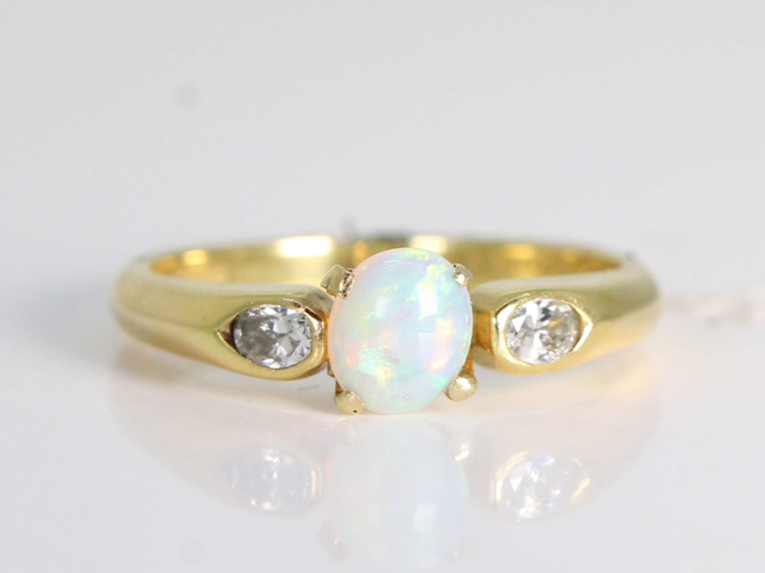 Vintage opal and diamond 18ct gold trilogy ring