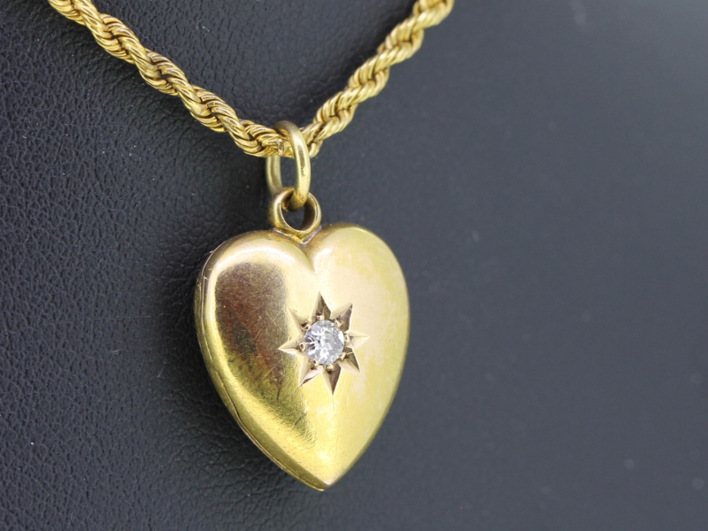 Wonderful edwardian 15 carat gold diamond heart locket and chain 