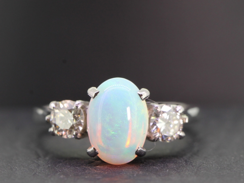 Gorgeous australian opal and diamond trilogy platinum ring