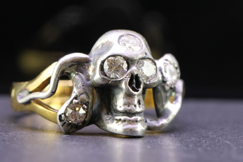 Handsome edwardian memento mori 22 carat gold/silver skull and serpent ring