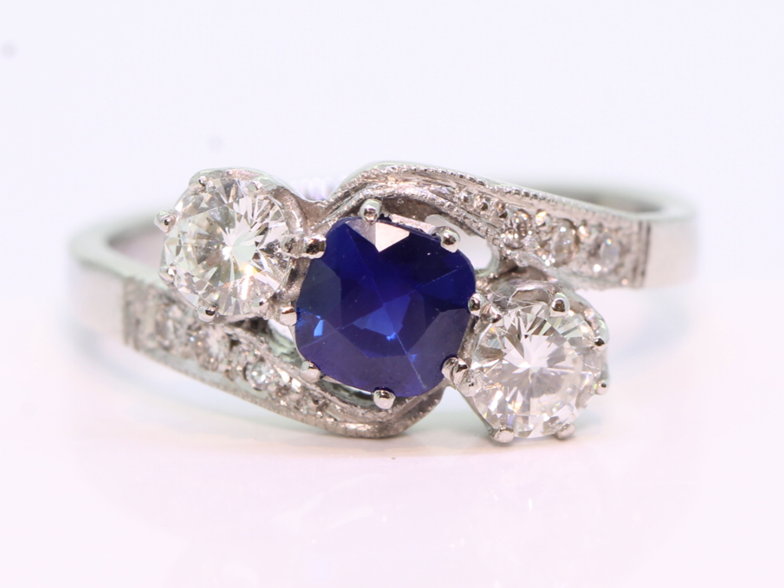 Stunning sapphire and diamond trilogy platinum edwardian  ring