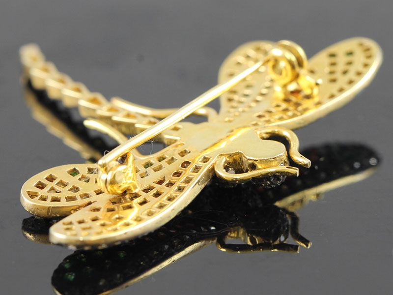 Beautiful garnet and diamond gold/silver dragonfly brooch