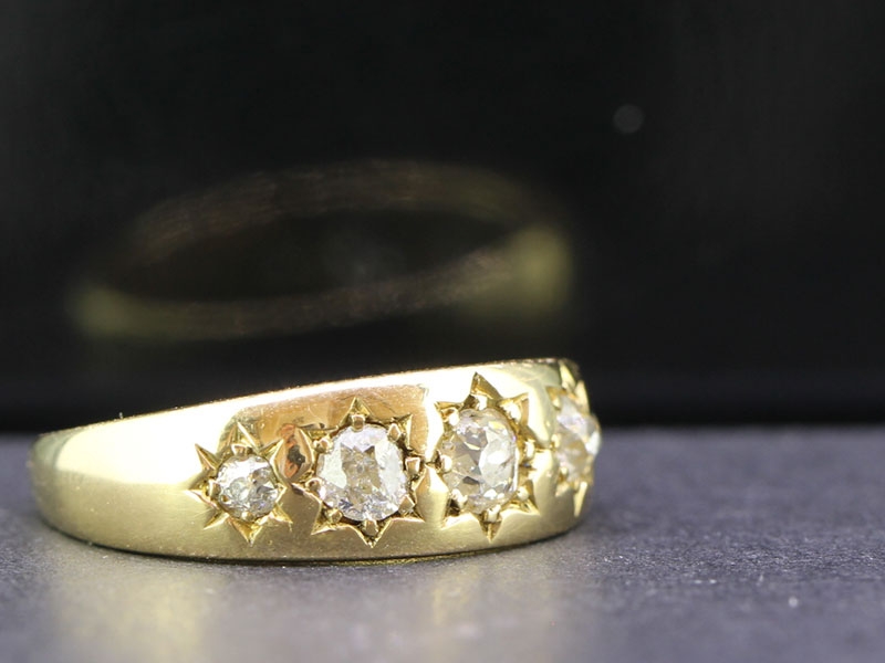 Wonderful five stone diamond 18 carat gold gypsy ring