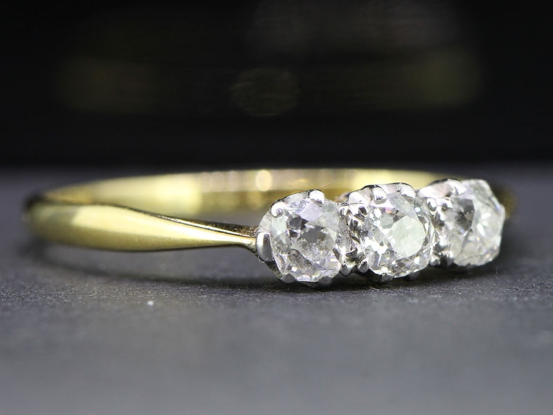 Elegant old mine cut three stone diamond 18 carat gold ring