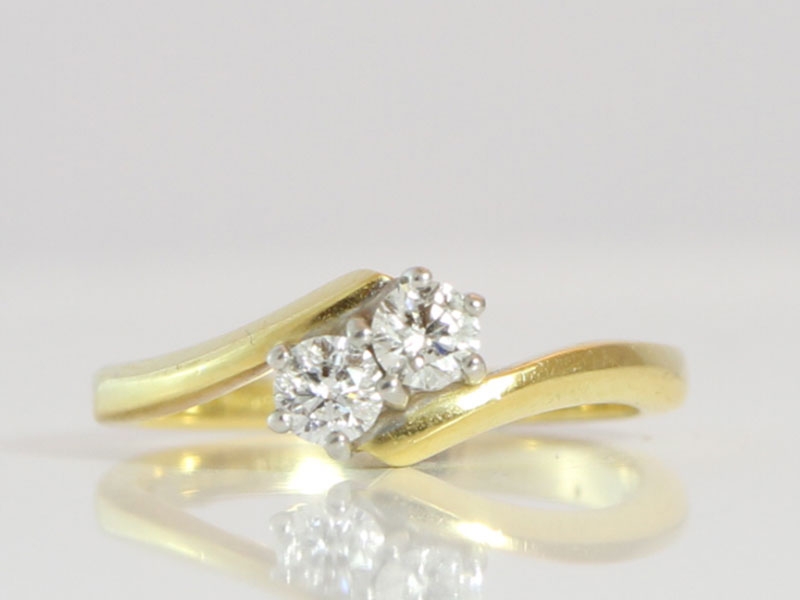 Gorgeous two stone diamond on a twist in 18 carat gold