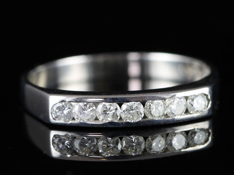 Breathtaking round brilliant cut diamond eternity ring in 18 carat white gold