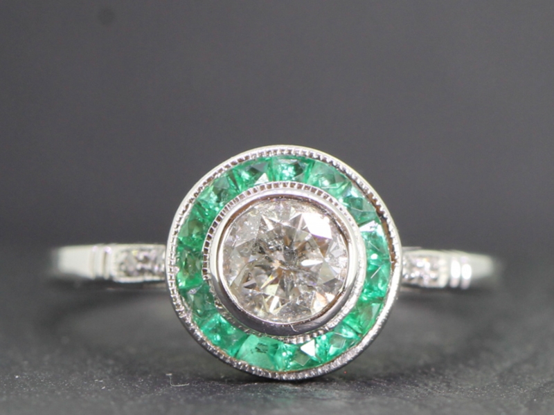 Beautiful diamond and emerald art deco inspired platinum ring