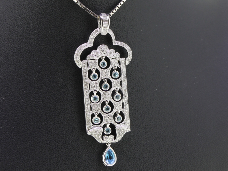Stunning aquamarine and diamond 18 carat gold pendant and chain