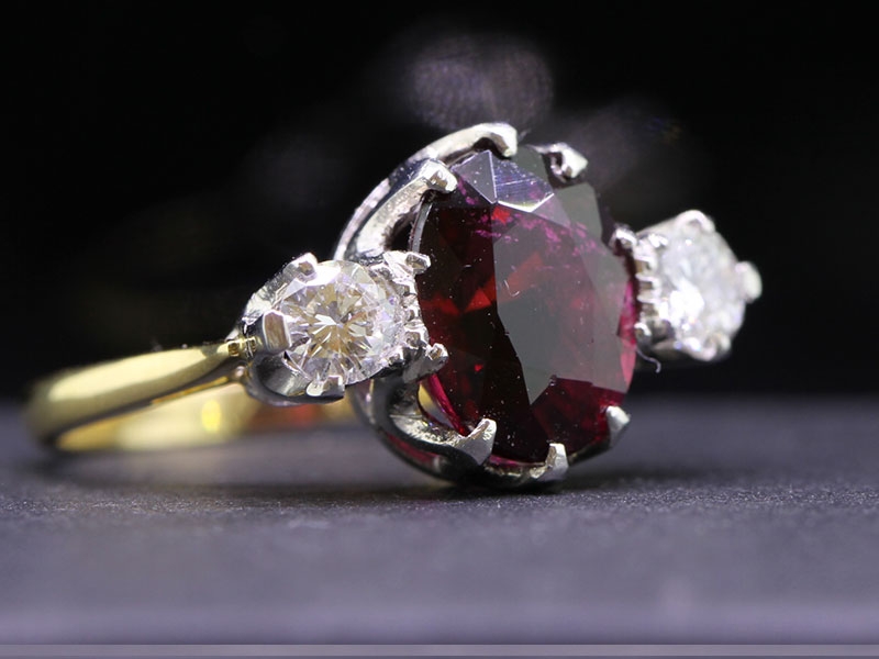 Elegant rubellite and diamond trilogy 18 carat gold ring