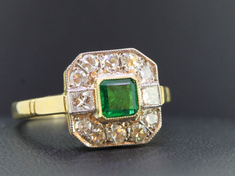 Stunning emerald and diamond 18 carat gold and platinum cluster ring