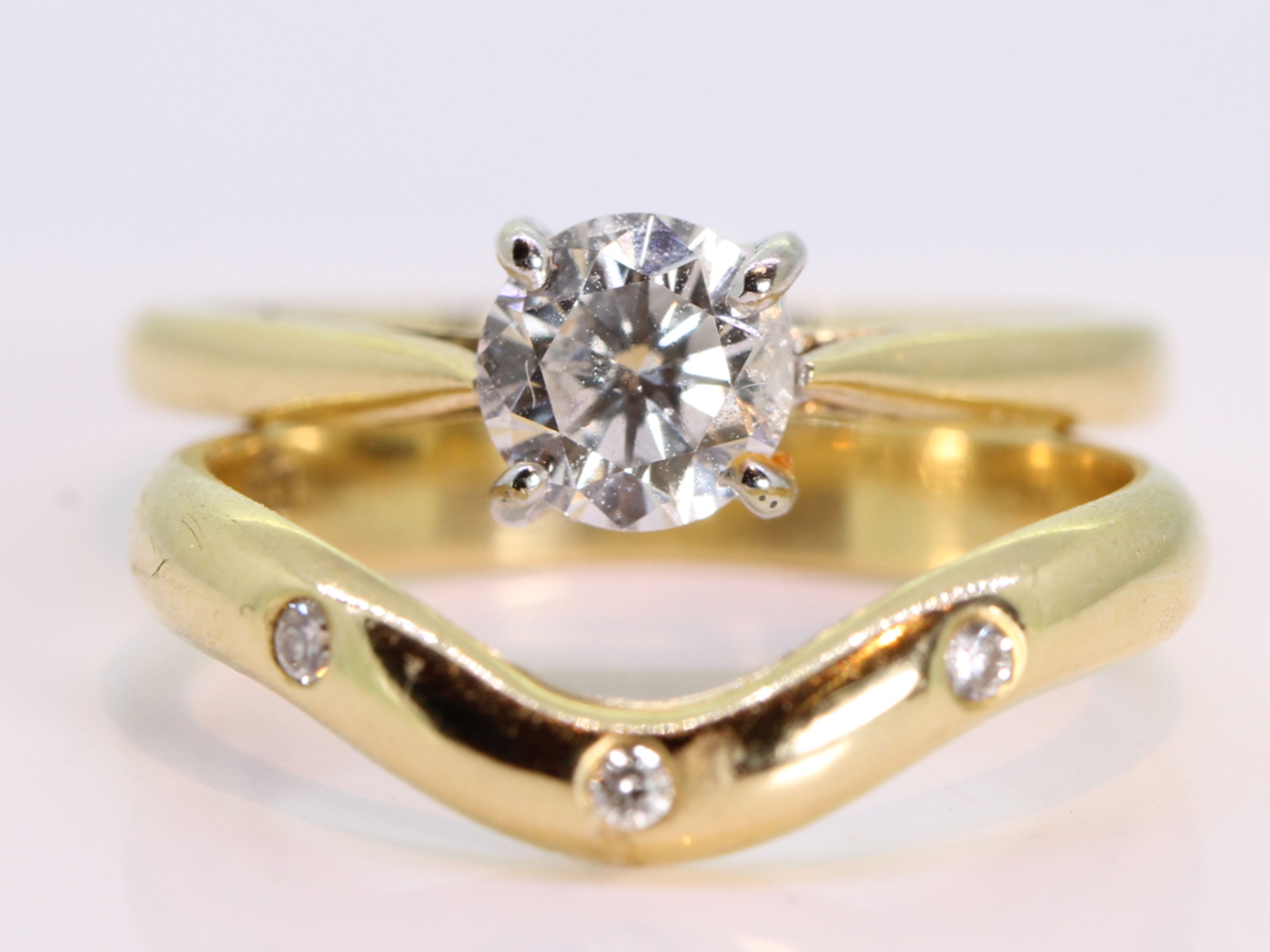Classic bridal wedding band and solitaire diamond 18ct gold set