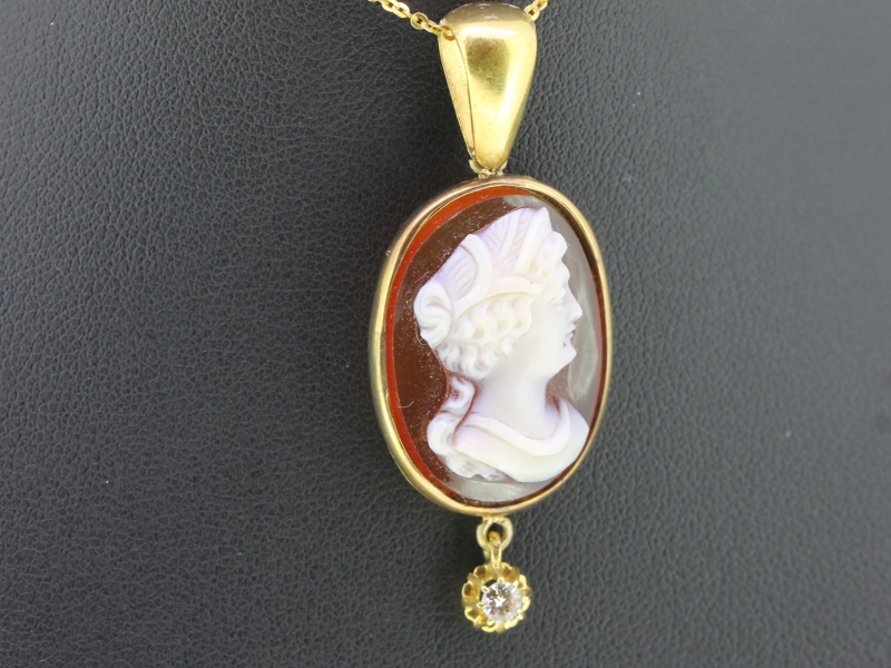 A fabulous antique edwardian cameo and diamond pendant
