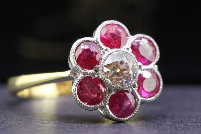 Dramatic ruby and diamond daisy cluster 18 carat gold and platinum ring