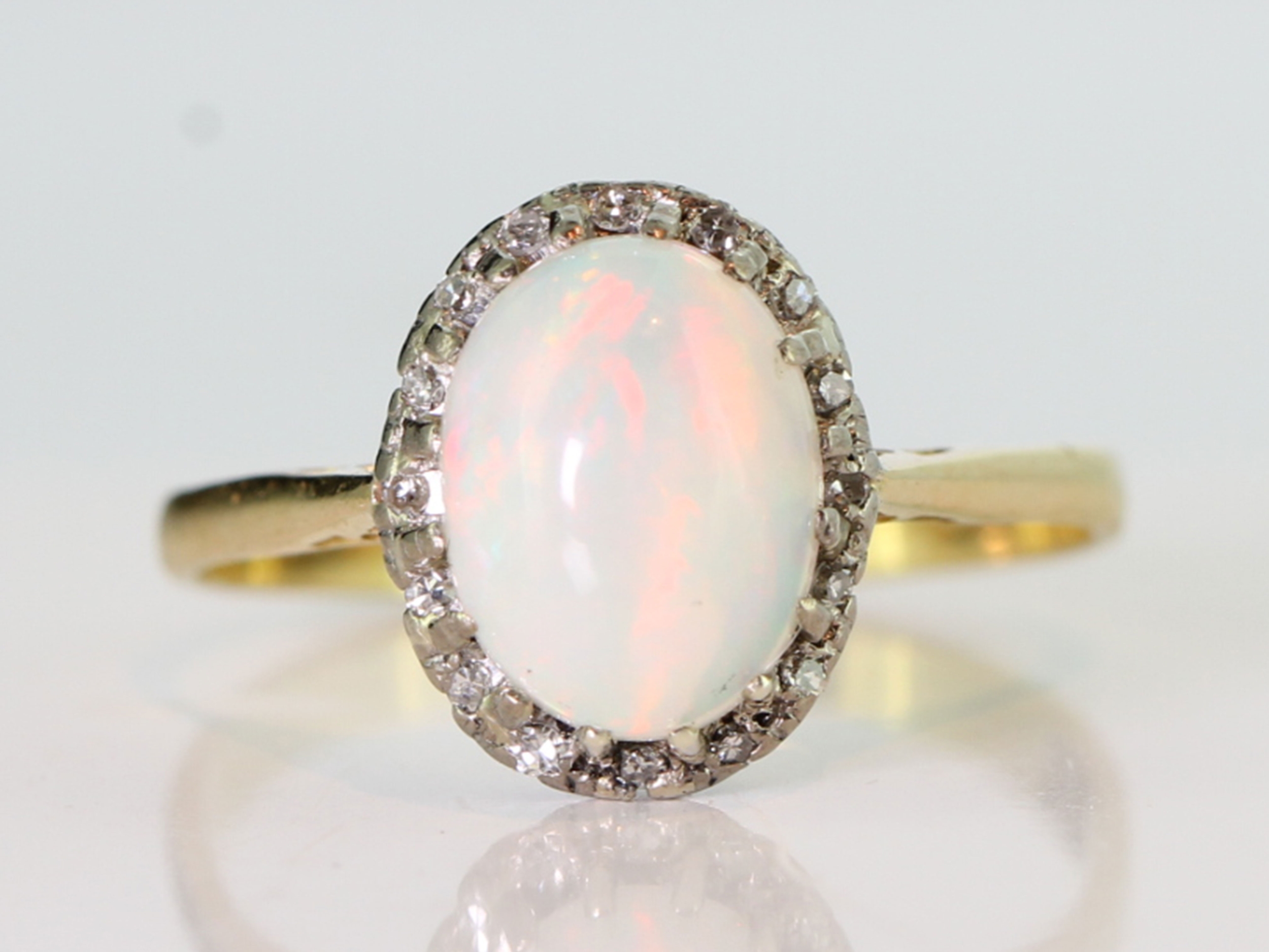 Wonderful vintage opal and diamond cluster 18 carat gold ring